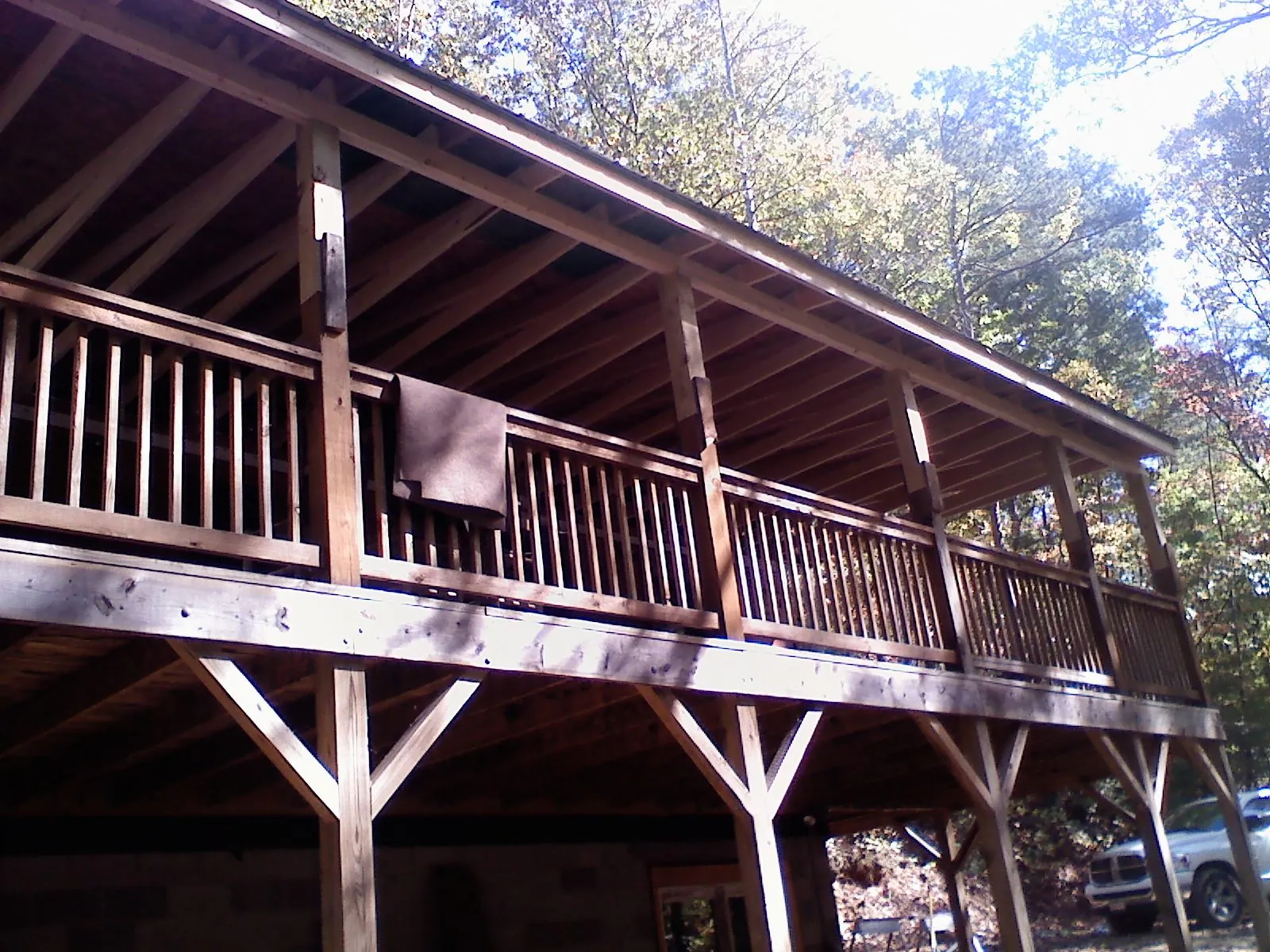 Timber framing under a new elevated porch and deck — Roof Leak Repair in Washburn by Roofing Brothers